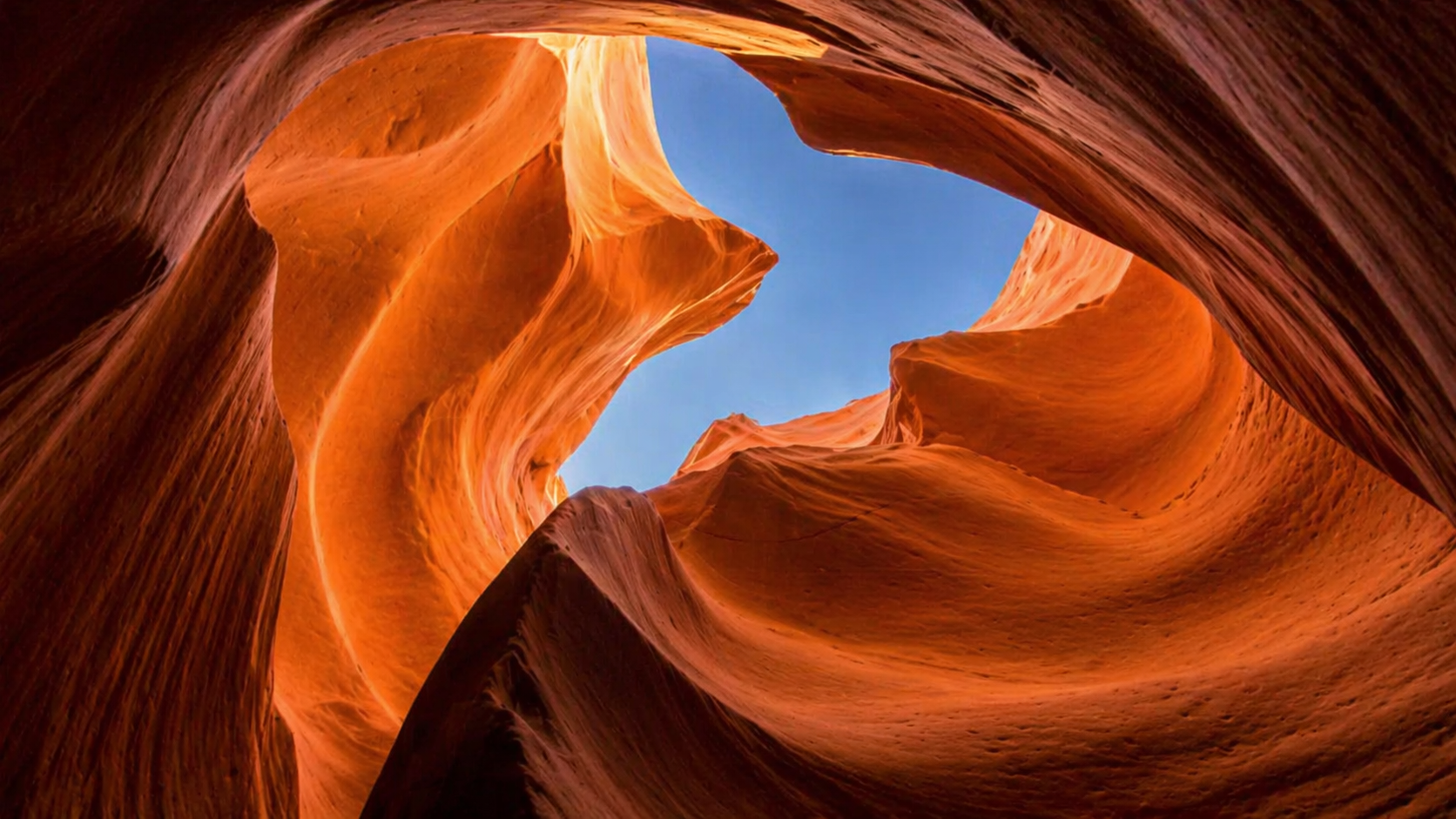 Upper Antelope Canyon tour in Page Arizona with glowing sandstone curves